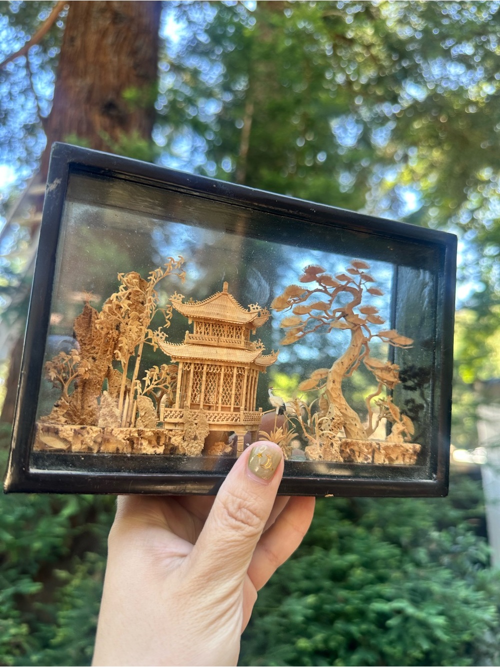 vintage Chinese hand-carved cork diorama, often framed in black lacquered wood